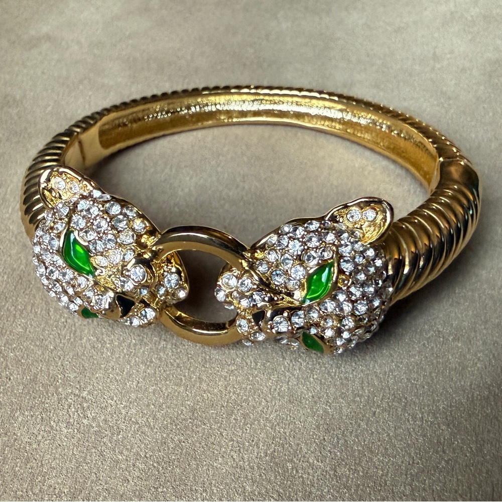 Elegant Gold Cougar Bracelet with Green Accents